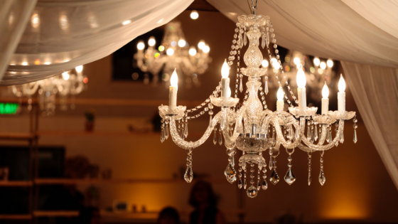 chandeliers at a Utah wedding reception provide perfect lighting