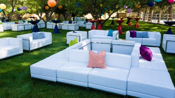 comfortable white sofas at an outdoor Utah wedding reception