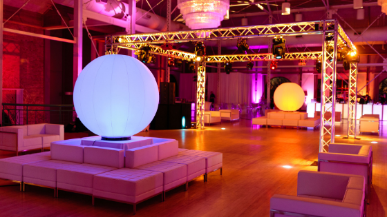 a dance floor with beautiful lighting at a Utah wedding reception