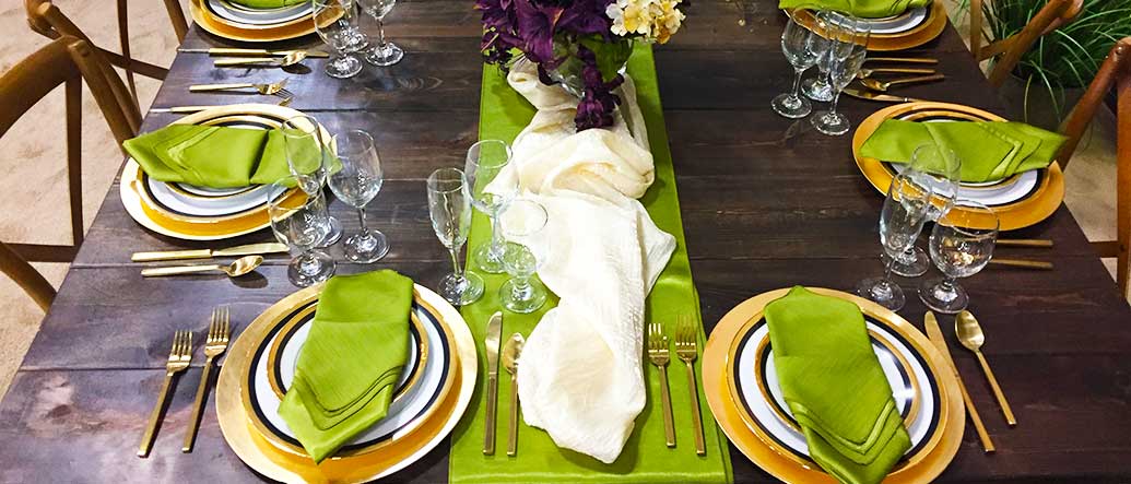 Table Setting with Gold colored China and Flatware for rent in Salt Lake City Utah